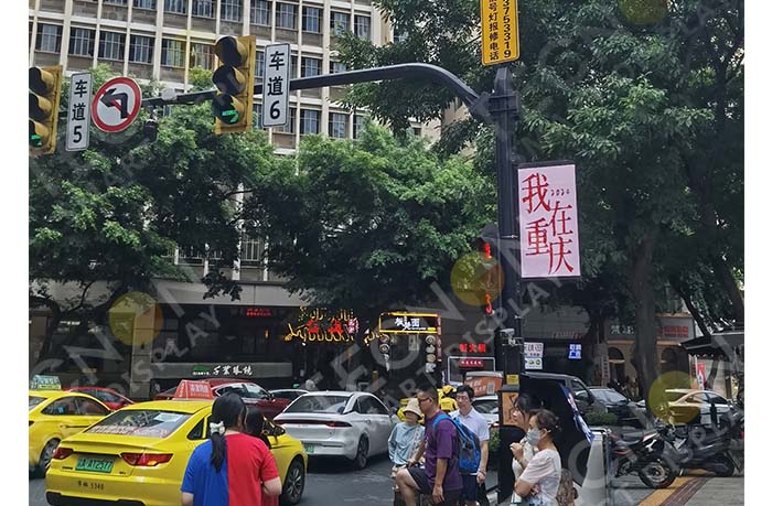 Close-up of lamp pole LED screen cabinet