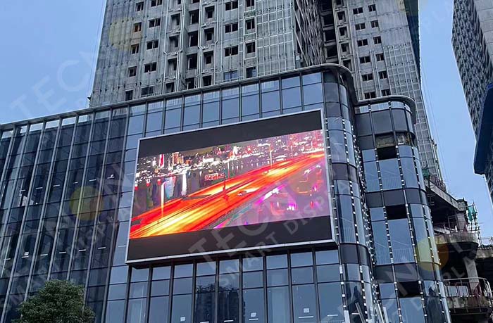 Close-up of waterproof outdoor LED display cabinet with IP65 protection rating.