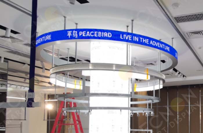 Circular LED panel used in the Peacebird women’s clothing store, creating an eye-catching modern display.