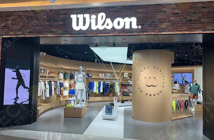 Indoor LED wall mounted screen displaying Wilson brand visuals
