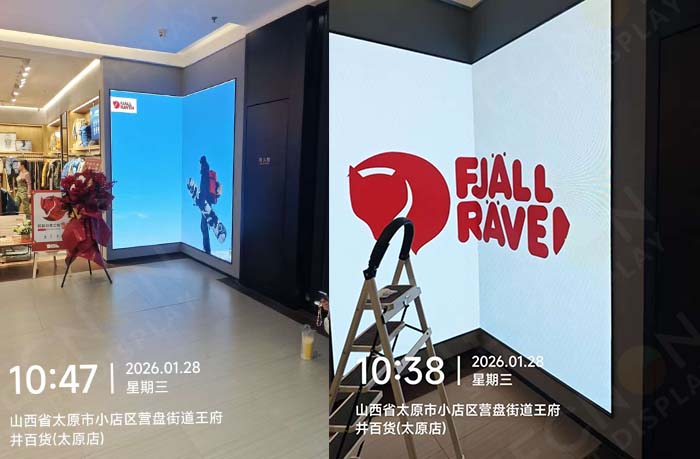 L-shaped LED display screen at Fjällräven retail store entrance